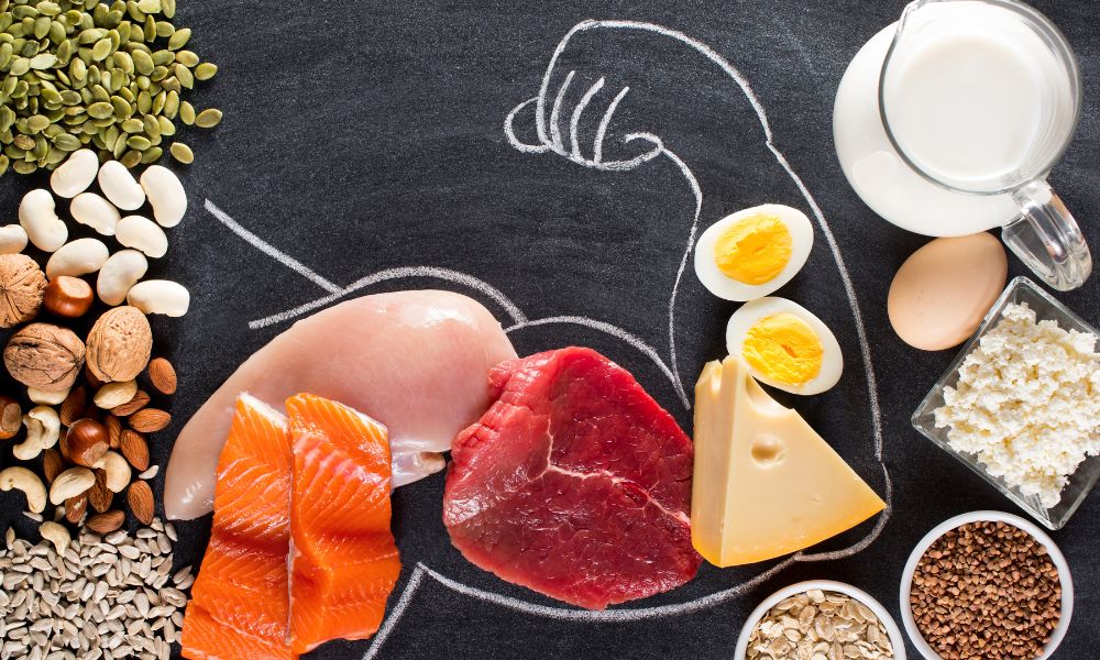 high protein foods inside an outline of a bicep 