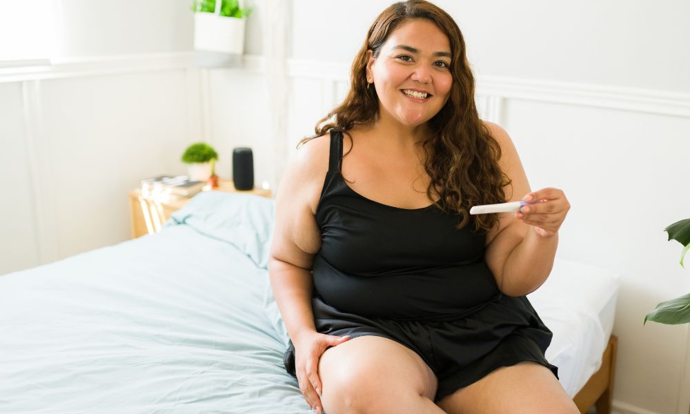 happy pregnant obese women